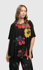 Load image into Gallery viewer, Front top half view of a woman wearing the garden catalonia trapeze top
