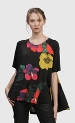 Load image into Gallery viewer, Front top half view of a woman wearing the garden catalonia trapeze top
