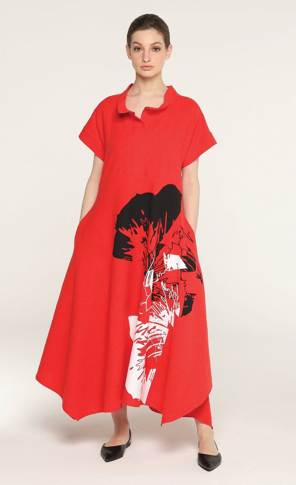 Front full body view of a woman wearing the igor cate dress in red.