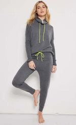 Load image into Gallery viewer, Front full body view of a woman wearing the lisa todd chill factor jogger and pullover
