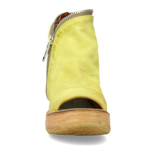 front view of the AS98 naylor wedge sandal in the color zen/yellow. this sandal has a wood-like wedge and leather overing the foot and ankle. The sandal has an open toe and heel and the outer side of the sandal has a zipper. 
