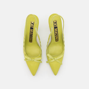 birdseye view of a pair of the kat maconie Kacy high heel in the color celery.