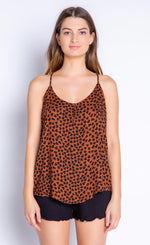 Load image into Gallery viewer, Front view of the top half of a woman wearing the PJ Salvage Wild Love Cami. This cami is mocha/brown colored with a black heart shaped animal print all over it. The round neck has two front buttons at the center.
