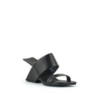 Load image into Gallery viewer, outer front side view of the united nude loop hi sandal. This black square toed sandal is high-heeled and showcases a floating-like heel and two bands over the instep.  
