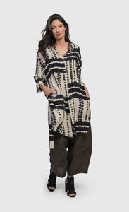Front full body view of a woman wearing the alembika savanna adventurer tunic top