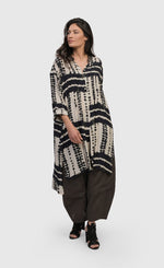 Load image into Gallery viewer, Front full body view of a woman wearing the alembika savanna adventurer tunic top
