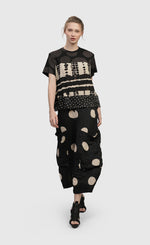 Load image into Gallery viewer, Front full body view of a woman wearing the Alembika Circles Party Pants
