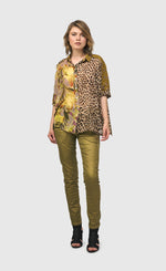 Load image into Gallery viewer, Alembika front full body view of a woman wearing the alembika iconic stretch jeans in green snake.
