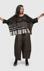 Load image into Gallery viewer, Front full body view of a woman wearing the Alembika Izma Boxy Tee.
