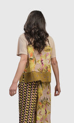 Load image into Gallery viewer, back  top half view of a woman wearing the alembika mix escher boxy tee
