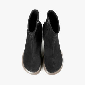 Birdseye view of the all black footwear mod stretch bootie in black and grey