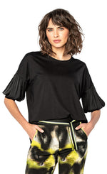 Load image into Gallery viewer, Front top half view of a woman wearing the black half sleeve blouse.
