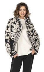 Load image into Gallery viewer, Front top half view of a woman wearing the Beate Heymann Reversible Black &amp; White Jacket

