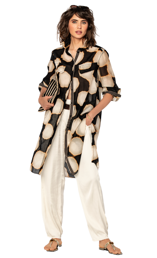 Front full body view of a woman wearing the beate heymann black and cream circles long shirt