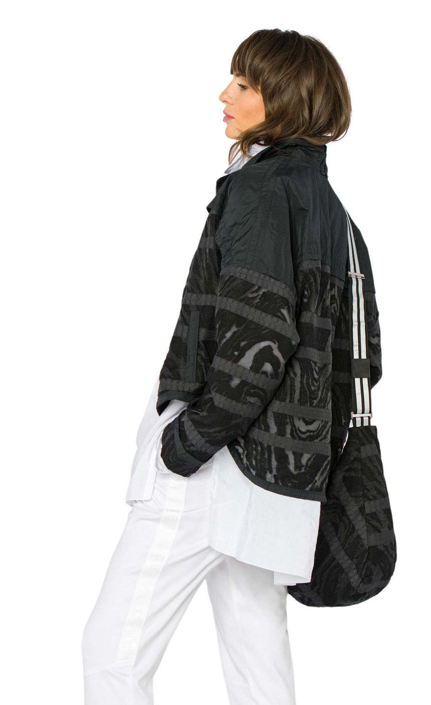 Back top half view of a woman wearing the Beate Heymann Midnight Taffeta Lace Jacket