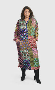 Front full body view of a woman wearing the Alembika Lucy Kaleidoscope Maxi Dress 
