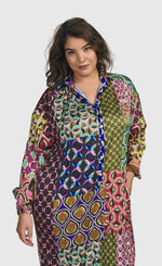 Load image into Gallery viewer, Front top half view of a woman wearing the Alembika Lucy Kaleidoscope Maxi Dress
