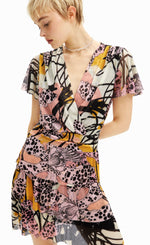 Load image into Gallery viewer, front close up view of a woman wearing the desigual m christian la croix orchid mini dress
