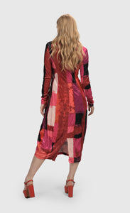 Back full body view of a woman wearing the Alembika Sunset Strip Cocoon Magenta Dress