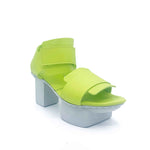 Load image into Gallery viewer, Outer front side view of the trippen visor shoe in the color lime with a white sole.
