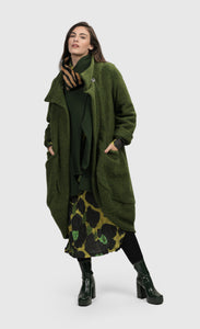 Front full body view of a woman wearing the Alembika Green Gala Cocoon Jacket