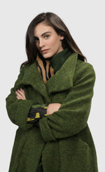 Load image into Gallery viewer, Front close up view of a woman wearing the Alembika Green Gala Cocoon Jacket
