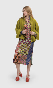 Front full body view of a woman wearing the Alembika Lucy Kaleidoscope Maxi Dress