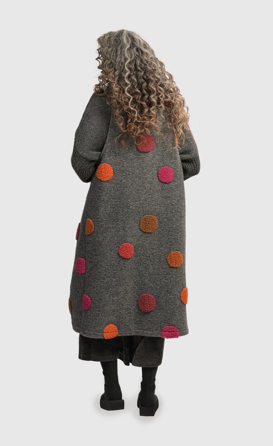 Back full body view of a woman wearing the Alembika Urban Sorbet Everyday Bubbles Vest