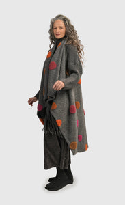 Left side full body view of a woman wearing the Alembika Urban Sorbet Everyday Bubbles Vest