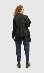 Load image into Gallery viewer, Back full body view of a woman wearing the Alembika Urban Strut Poker Jacket
