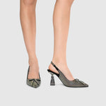 Load image into Gallery viewer, Front and inner side view of a woman wearing a pair of the kat maconie eloise pumps in black.
