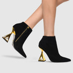 Load image into Gallery viewer, Outer and inner side view of a woman wearing the kat maconie sofi boots in black/gold.
