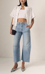 Load image into Gallery viewer, Woman wearing a white jacket, white top, and blue jeans on a plain background
