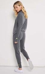 Load image into Gallery viewer, Back full body view of a woman wearing the lisa todd chill factor jogger and pullover
