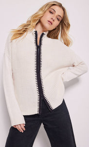 Front top half view of a woman wearing the lisa todd romancin sweater jacket