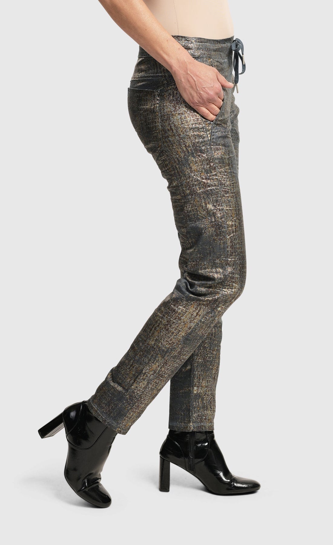 Right side bottom half view of the alembika Petrol Iconic Jeans Desires