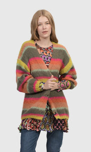 Front top half view of a woman wearing the Alembika Stripes Sweater