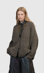 Load image into Gallery viewer, Front top half view of a woman wearing the alembika Taupe Sylvia Crop Cardigan
