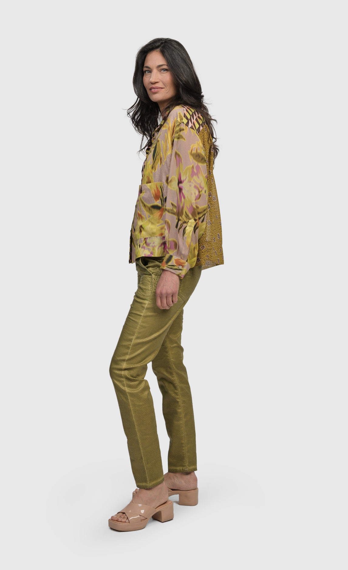 Front full body view of a woman wearing the alembika mix button down shirt 
