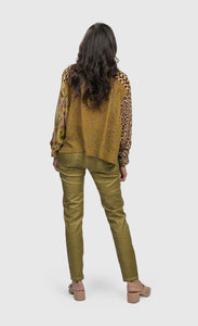 Back full body view of a woman wearing the alembika mix button down shirt 