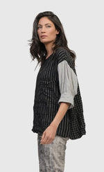 Load image into Gallery viewer, Left side top half view of a woman wearing the alembika mix top
