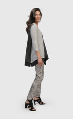 Load image into Gallery viewer, Right side top half view of a woman wearing the alembika mix asymmetric top
