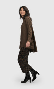 Left side full body view of a woman wearing the alembika Dynamite Days Straight Leg Pants in coffee.