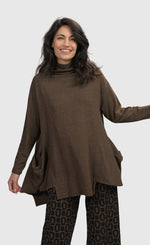 Load image into Gallery viewer, Front top half view of a woman wearing the Alembika Essential Trapeze Brown Top
