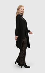 Load image into Gallery viewer, Right side full body view of a woman wearing the Alembika Essential Hi-Lo Button Down Top
