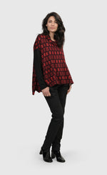 Load image into Gallery viewer, Front full body view of a woman wearing the Alembika Red Dynamite Swing Top
