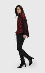 Load image into Gallery viewer, Left side full body view of a woman wearing the Alembika Red Dynamite Swing Top
