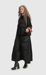 Load image into Gallery viewer, Left side full body view of a woman wearing the Alembika Urban Mix Stipe Pocket Top
