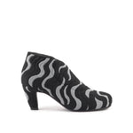 Load image into Gallery viewer, outside view of women's ankle boot with a wavy black and gray knit pattern, featuring a low block heel and rounded toe
