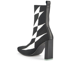 Inner back side view of the united nude tara boot hi in mono